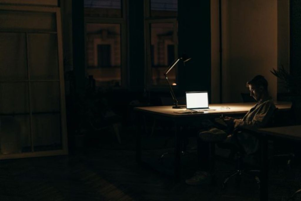 person working from home at night 