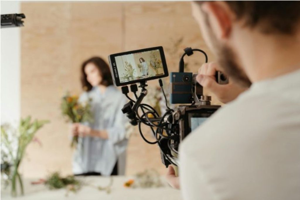 person shooting a video for Youtube 