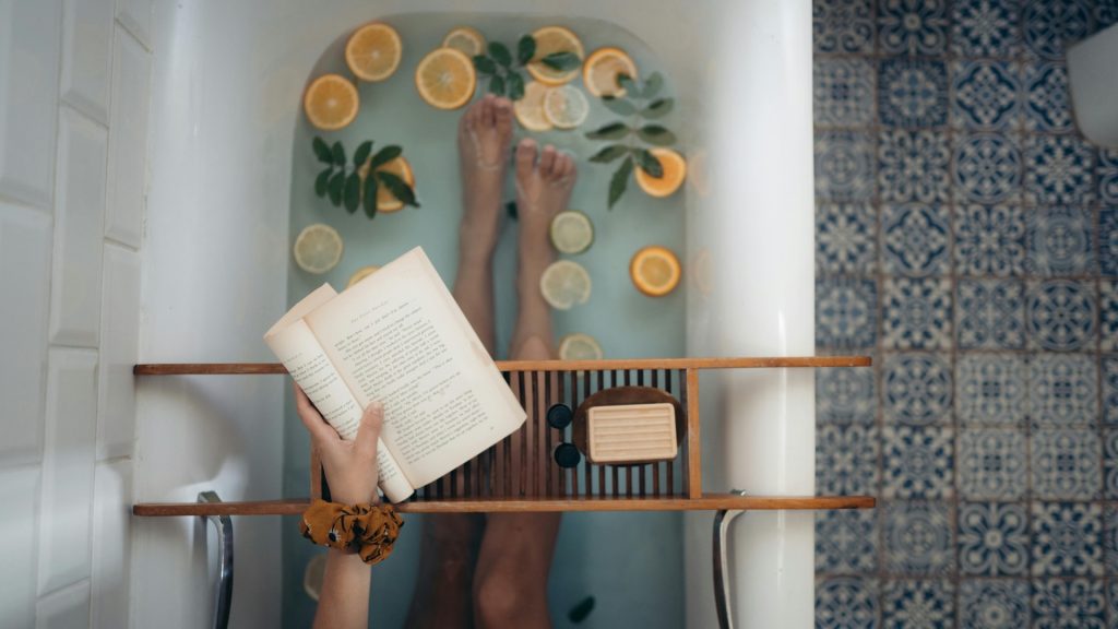 person reading in the bath