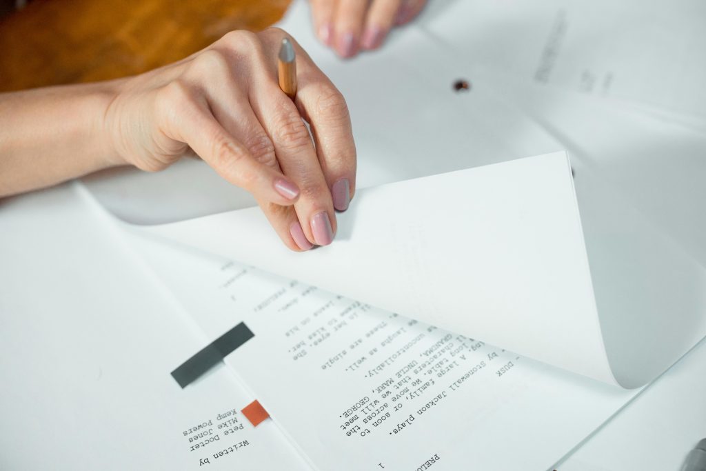 play being proofread on paper
