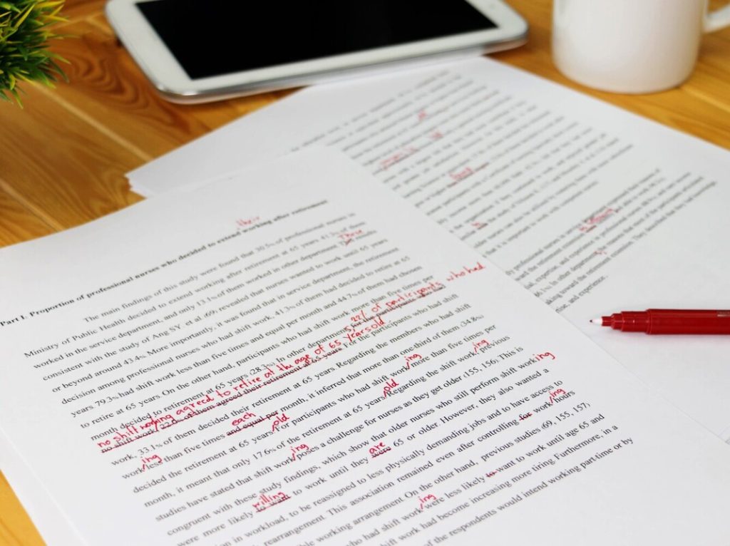 proofreading paper on table