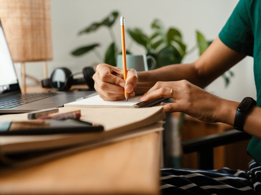 woman proofreading at home