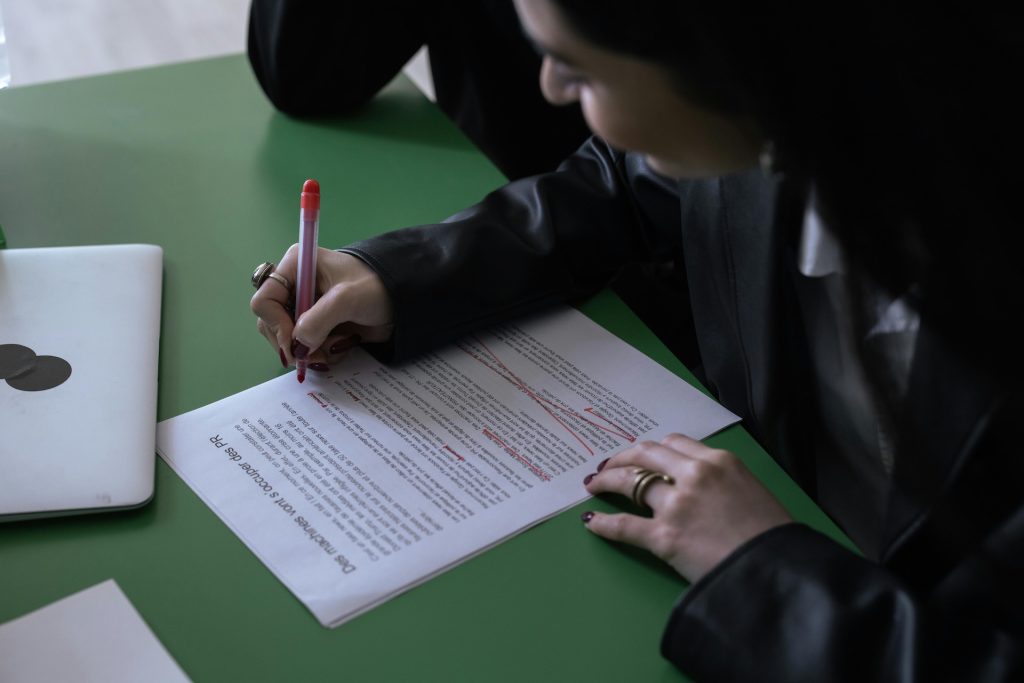 woman proofreading manuscript